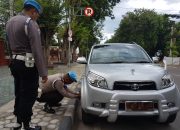 Parkir di KTL, Puluhan Kendaraan Anggota Polisi Digembosi