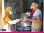 Satgas Covid-19 Puskemas Tombiano Bagikan Masker dan Obat Vitamin