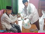 Imam Masjid dan Pegawai Syara di Sigi dapat Bantuan Disinfektan dan Masker dari BAZNAS