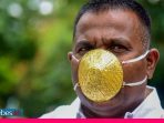 Pria India Pakai Masker Berlapis Emas Gegara Ada yang Bikin dari Perak