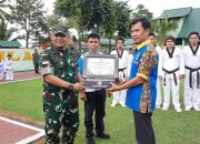 Penghargaan untuk Dandim 1307/Poso atas Pembinaan Prestasi Taekwondo di Kabupaten Poso